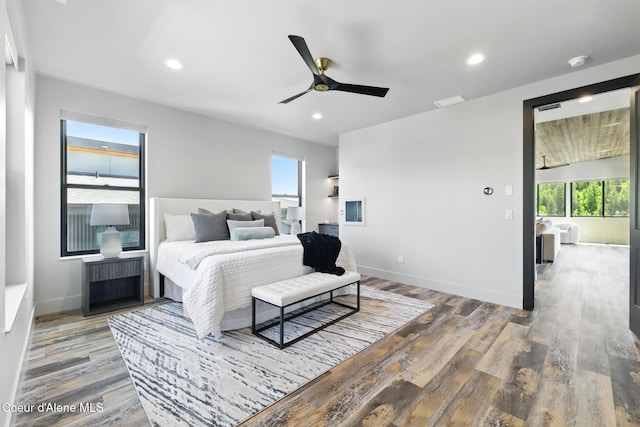 2888 W Lumber Ln, Coeur Dalene, ID 83814 - bedroom featuring wood finished floors, baseboards, recessed lighting, and ceiling fan