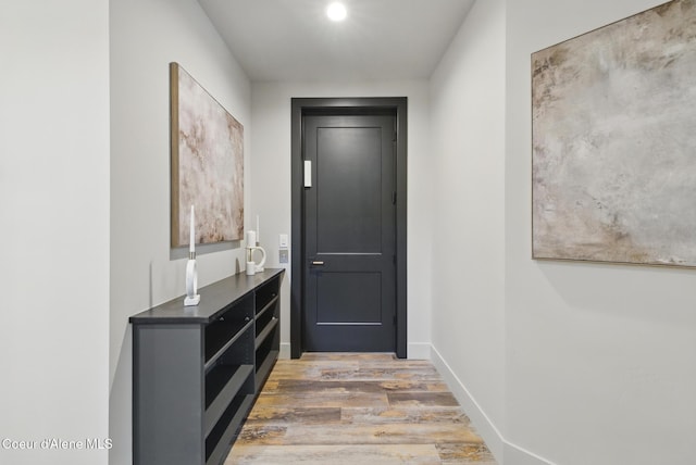 2888 W Lumber Ln, Coeur Dalene, ID 83814 - entryway with wood finished floors and baseboards