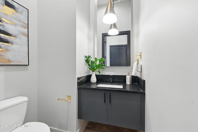 2888 W Lumber Ln, Coeur Dalene, ID 83814 - half bath with vanity and toilet