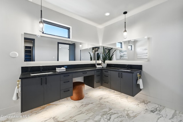 2888 W Lumber Ln, Coeur Dalene, ID 83814 - full bath with double vanity, baseboards, marble finish flooring, and a high ceiling
