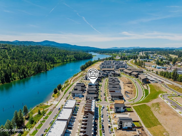 2888 W Lumber Ln, Coeur Dalene, ID 83814 - drone / aerial view of a water and mountain view and a heavily wooded area