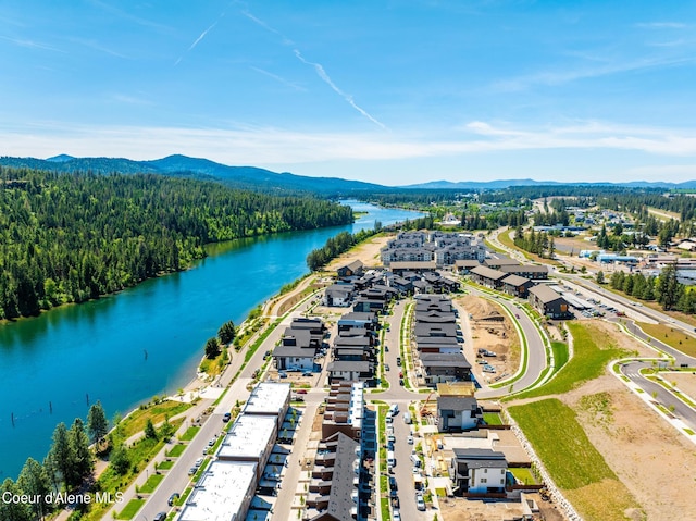 2888 W Lumber Ln, Coeur Dalene, ID 83814 - drone / aerial view of a water and mountain view and a heavily wooded area