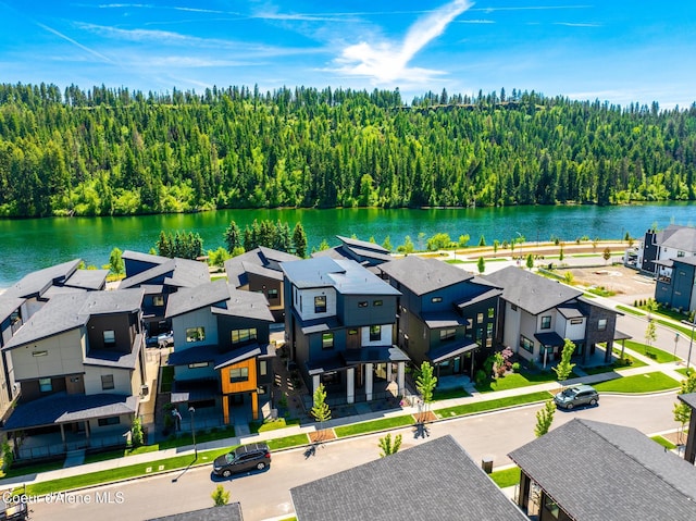 2888 W Lumber Ln, Coeur Dalene, ID 83814 - aerial view of residential area featuring a heavily wooded area and a nearby body of water