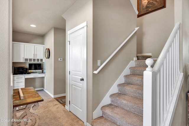3423 E Hope Ave, Post Falls, ID 83854 - stairs featuring recessed lighting, baseboards, and carpet flooring