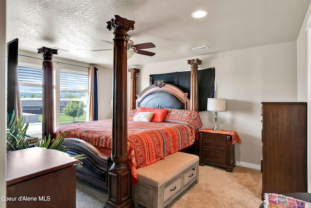 3423 E Hope Ave, Post Falls, ID 83854 - bedroom with light colored carpet, baseboards, a textured ceiling, recessed lighting, and a ceiling fan