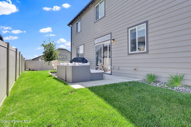 3423 E Hope Ave, Post Falls, ID 83854 - back of property with outdoor lounge area and a patio