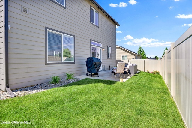 3423 E Hope Ave, Post Falls, ID 83854 - rear view of house featuring a patio area