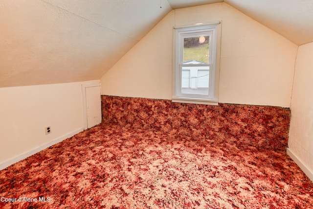 59A Creek Side Dr, Wallace, ID 83873 - additional living space featuring vaulted ceiling and carpet