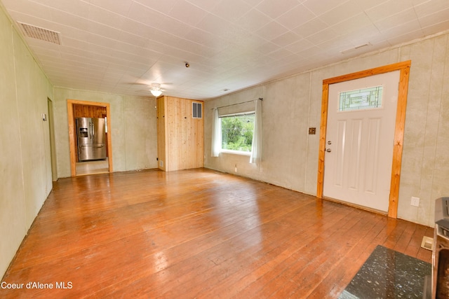59A Creek Side Dr, Wallace, ID 83873 - unfurnished living room featuring hardwood / wood-style flooring and a ceiling fan
