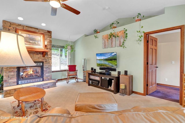5340 W Hull Loop, Coeur Dalene, ID 83814 - living room with vaulted ceiling, baseboards, carpet floors, a stone fireplace, and ceiling fan