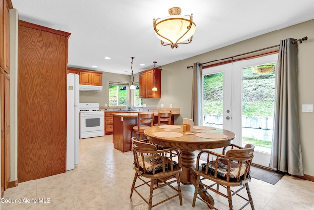 5340 W Hull Loop, Coeur Dalene, ID 83814 - dining area featuring french doors and recessed lighting