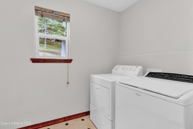 5340 W Hull Loop, Coeur Dalene, ID 83814 - laundry area featuring washer and dryer and baseboards