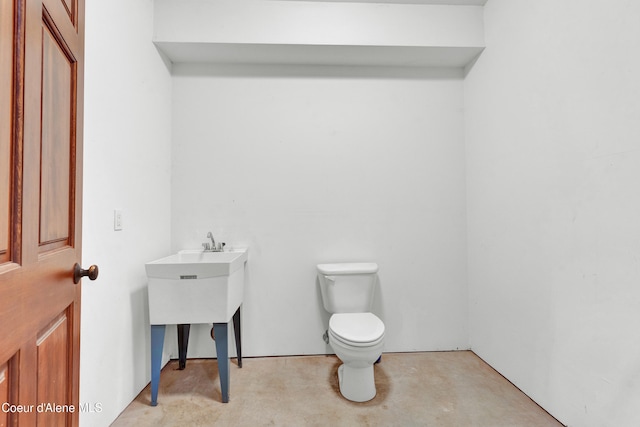5340 W Hull Loop, Coeur Dalene, ID 83814 - bathroom with toilet and concrete flooring