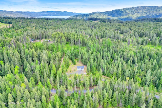 5340 W Hull Loop, Coeur Dalene, ID 83814 - drone / aerial view of a forest and a mountainous background