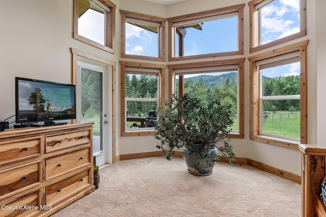 88 Fenway Dr, Sagle, ID 83860 - sitting room with light carpet, baseboards, and a mountain view