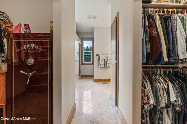88 Fenway Dr, Sagle, ID 83860 - walk in closet featuring light tile patterned floors