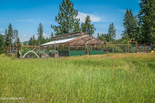 88 Fenway Dr, Sagle, ID 83860 - view of yard with an exterior structure and an outbuilding