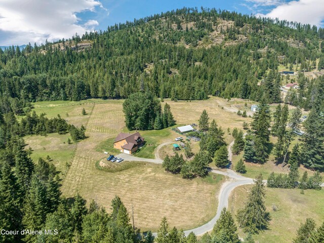 88 Fenway Dr, Sagle, ID 83860 - aerial overview of property's location with a heavily wooded area and rural landscape
