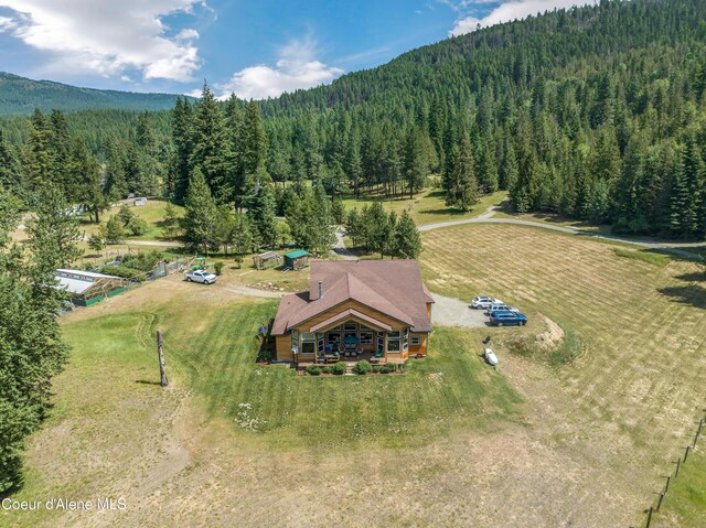 88 Fenway Dr, Sagle, ID 83860 - aerial view of property and surrounding area featuring a forest and mountains
