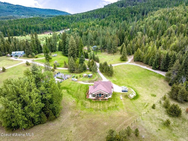 88 Fenway Dr, Sagle, ID 83860 - bird's eye view of a heavily wooded area and a mountainous background