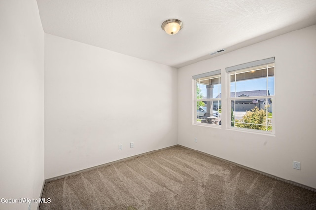 4717 N Connery Loop, Post Falls, ID 83854 - carpeted empty room featuring baseboards