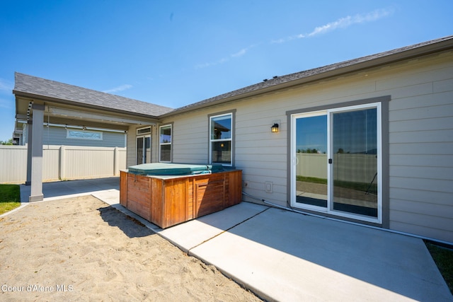 4717 N Connery Loop, Post Falls, ID 83854 - view of patio / terrace with a hot tub