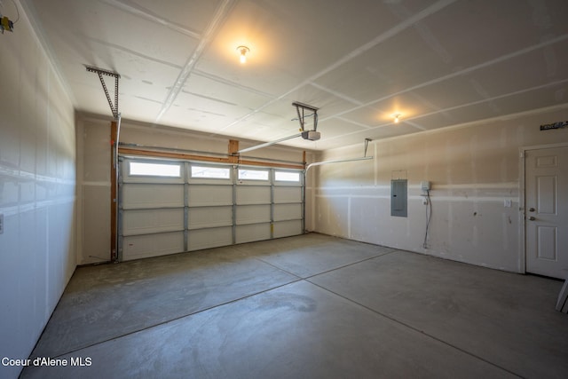 4717 N Connery Loop, Post Falls, ID 83854 - garage featuring electric panel and a garage door opener