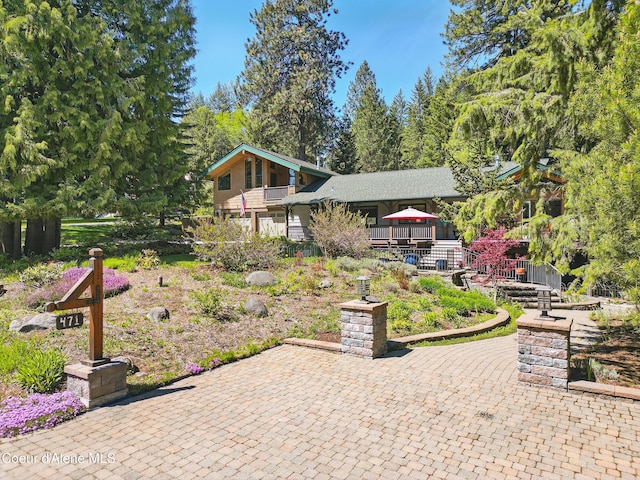 471 Kaniksu Shores Rd, Sandpoint, ID 83864 - view of front facade with a deck