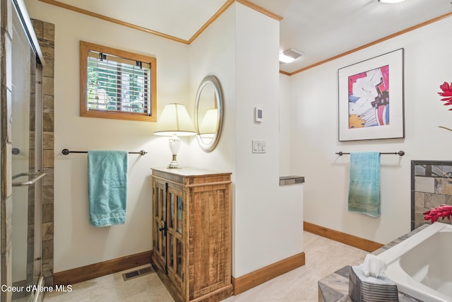 471 Kaniksu Shores Rd, Sandpoint, ID 83864 - bathroom with ornamental molding, baseboards, a tub to relax in, and an enclosed shower