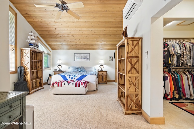 471 Kaniksu Shores Rd, Sandpoint, ID 83864 - bedroom with light carpet, a wall mounted AC, a closet, a walk in closet, and wooden ceiling