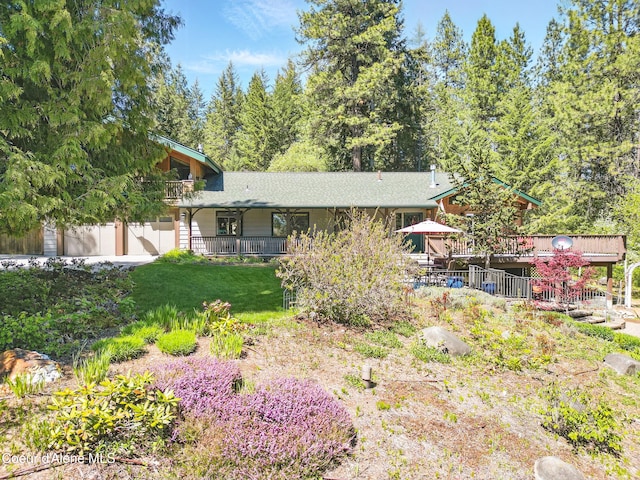 471 Kaniksu Shores Rd, Sandpoint, ID 83864 - rear view of house featuring a wooden deck