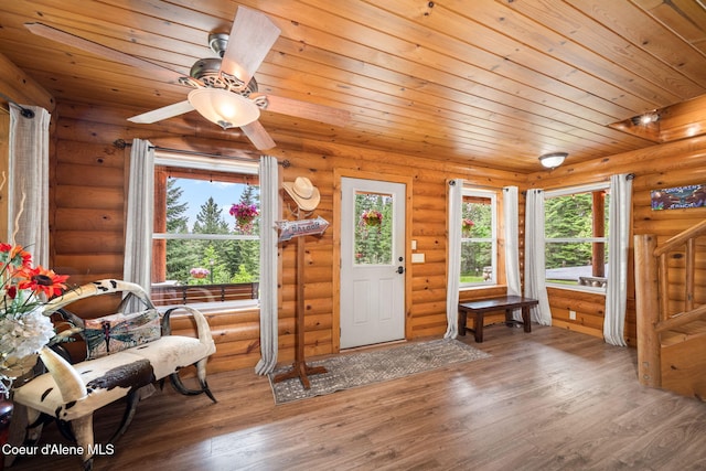 6918 E Garwood Rd, Hayden, ID 83835 - entrance foyer featuring wood finished floors, wooden ceiling, ceiling fan, and log walls