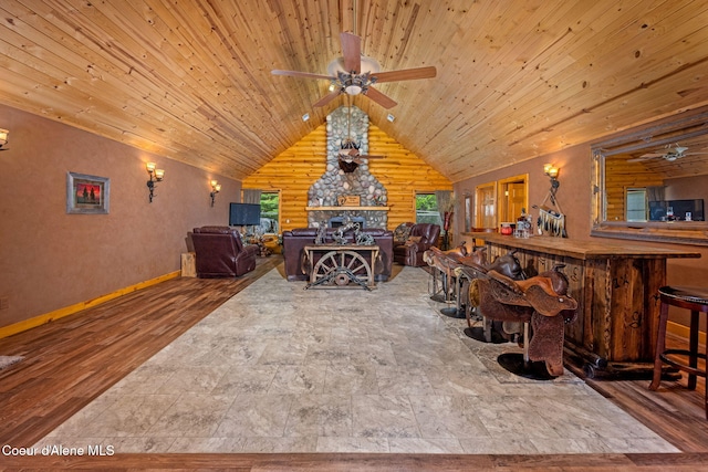 6918 E Garwood Rd, Hayden, ID 83835 - dining space with a ceiling fan, vaulted ceiling, healthy amount of natural light, wood ceiling, and wood finished floors