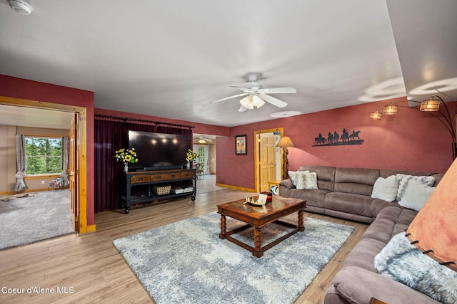 6918 E Garwood Rd, Hayden, ID 83835 - living area featuring ceiling fan, wood finished floors, and baseboards