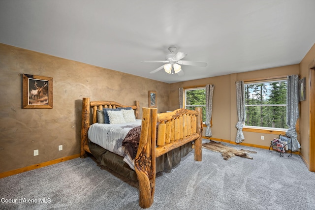 6918 E Garwood Rd, Hayden, ID 83835 - carpeted bedroom featuring baseboards and a ceiling fan