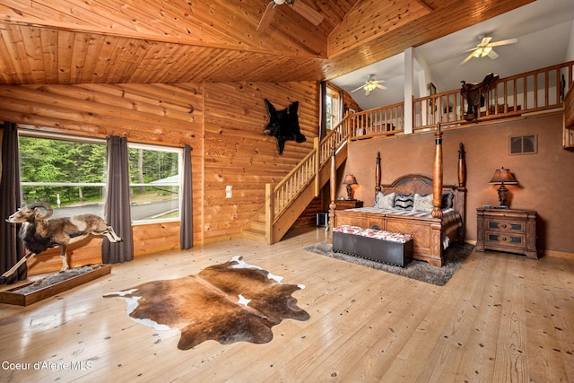 6918 E Garwood Rd, Hayden, ID 83835 - living room with stairway, ceiling fan, hardwood / wood-style floors, wooden ceiling, and high vaulted ceiling