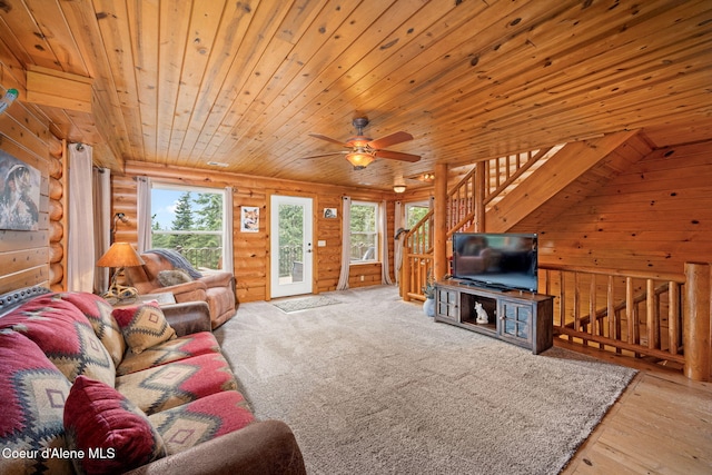6918 E Garwood Rd, Hayden, ID 83835 - living room with log walls, wooden ceiling, ceiling fan, and hardwood / wood-style flooring