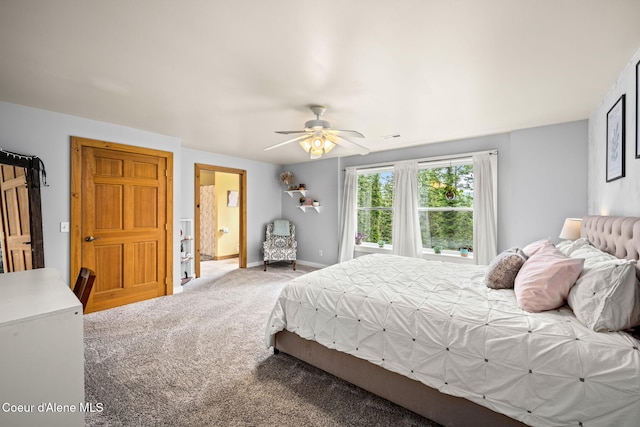 6918 E Garwood Rd, Hayden, ID 83835 - carpeted bedroom with baseboards and a ceiling fan