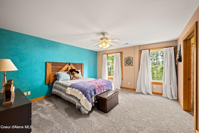 6918 E Garwood Rd, Hayden, ID 83835 - bedroom with carpet floors, baseboards, and ceiling fan