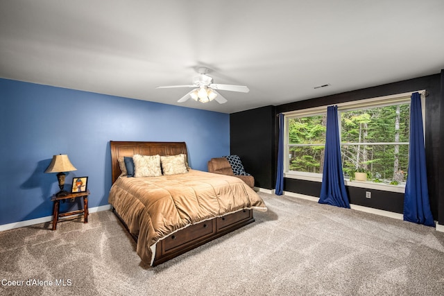 6918 E Garwood Rd, Hayden, ID 83835 - bedroom featuring carpet floors, baseboards, and a ceiling fan