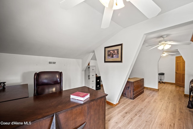 6918 E Garwood Rd, Hayden, ID 83835 - home office featuring a ceiling fan, lofted ceiling, light wood-type flooring, and baseboards