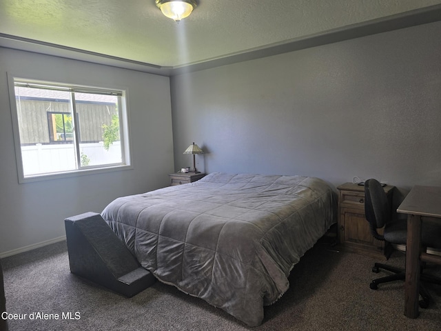 10566 N Seaside St, Hayden, ID 83835 - carpeted bedroom with baseboards