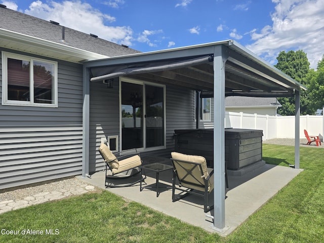 10566 N Seaside St, Hayden, ID 83835 - view of patio / terrace featuring a hot tub