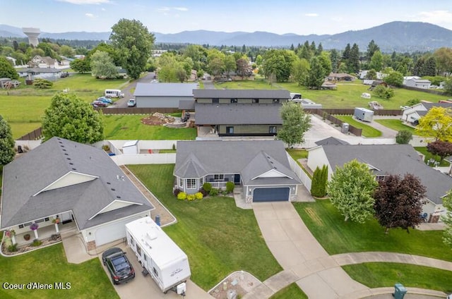 10566 N Seaside St, Hayden, ID 83835 - aerial perspective of suburban area with a mountain backdrop