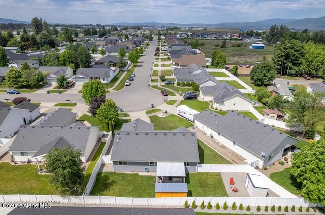 10566 N Seaside St, Hayden, ID 83835 - aerial view of residential area featuring a mountain backdrop