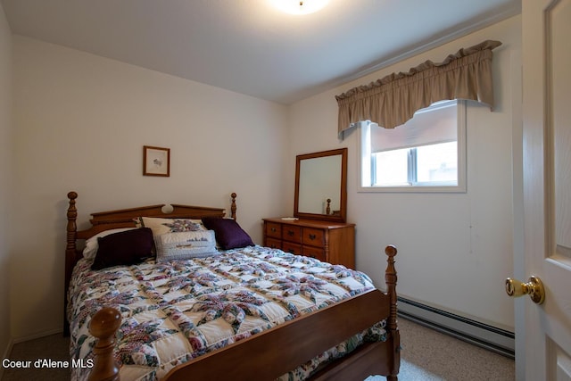 97 S Granite Bay Rd, Nordman, ID 83848 - bedroom featuring baseboard heating and carpet floors