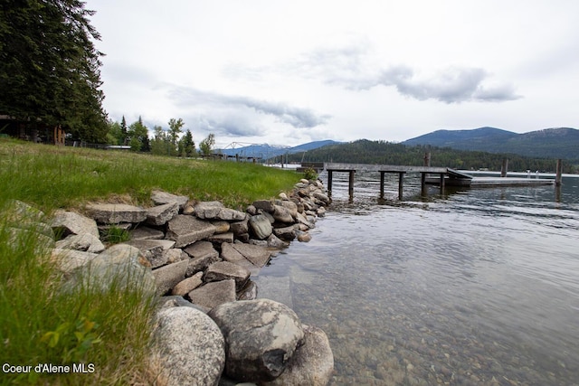 97 S Granite Bay Rd, Nordman, ID 83848 - water view with a dock and mountains
