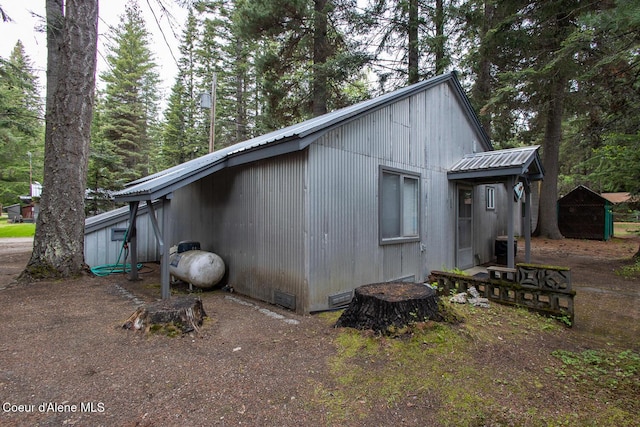 97 S Granite Bay Rd, Nordman, ID 83848 - view of property exterior featuring metal roof and crawl space