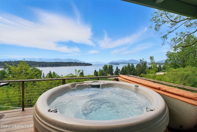 521 Aspen, Hope, ID 83836 - wooden terrace with a hot tub and a water and mountain view