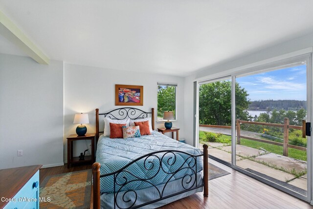 521 Aspen, Hope, ID 83836 - bedroom with a water view, wood finished floors, and baseboards